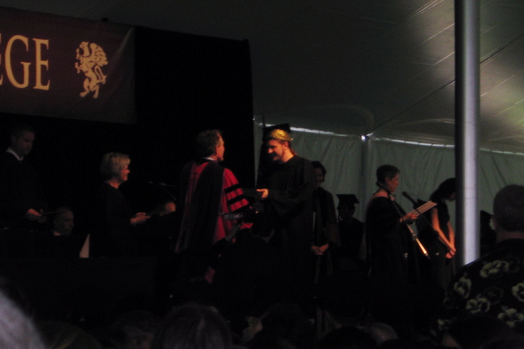 Tim Receives Diploma